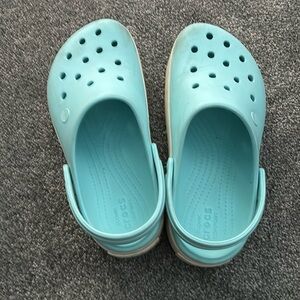 Comfy Crocs, with platform.